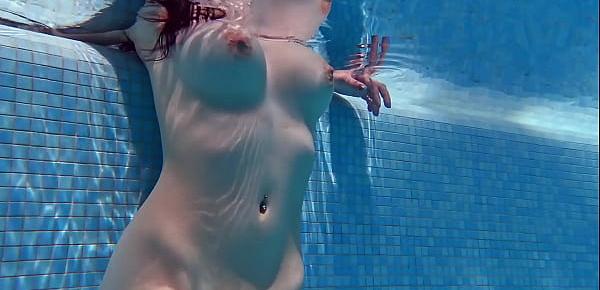  Sheril Blossom gets horny and naked in the pool